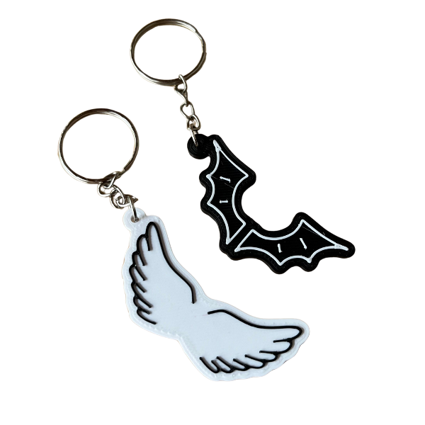 LLAVEROS DUKI ÁNGEL / DIABLO + STICKERS DE REGALO